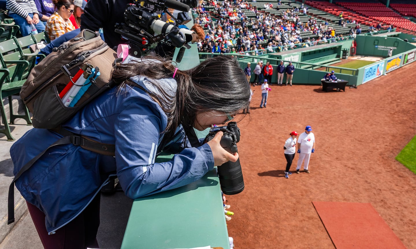 Caruso gets creative and shoots from the stands at Fenway Park.