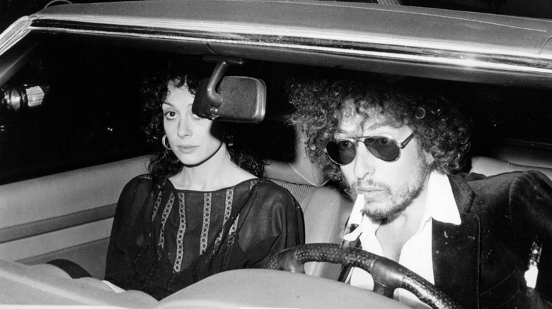 Bob Dylan and his wife Sarah in a car, 1976