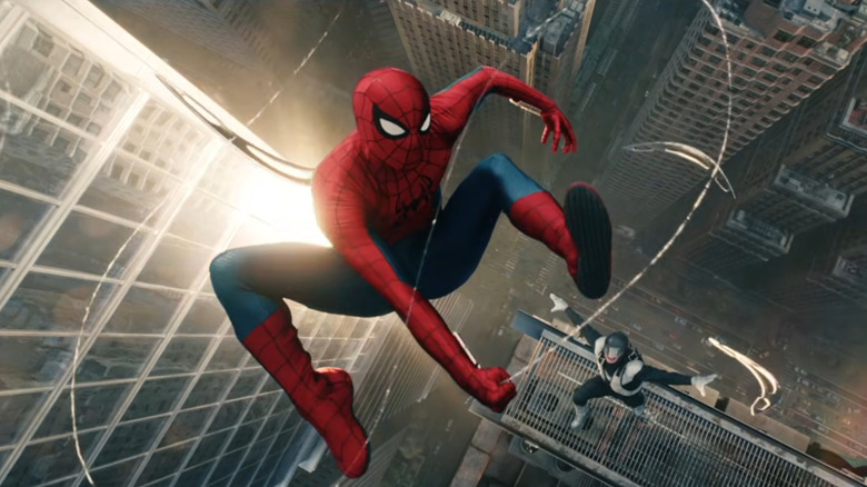 Tom Holland as Spider-Man swings between skyscrapers from the air as an unknown enemy chases him in Spider-Man: Brand New Day